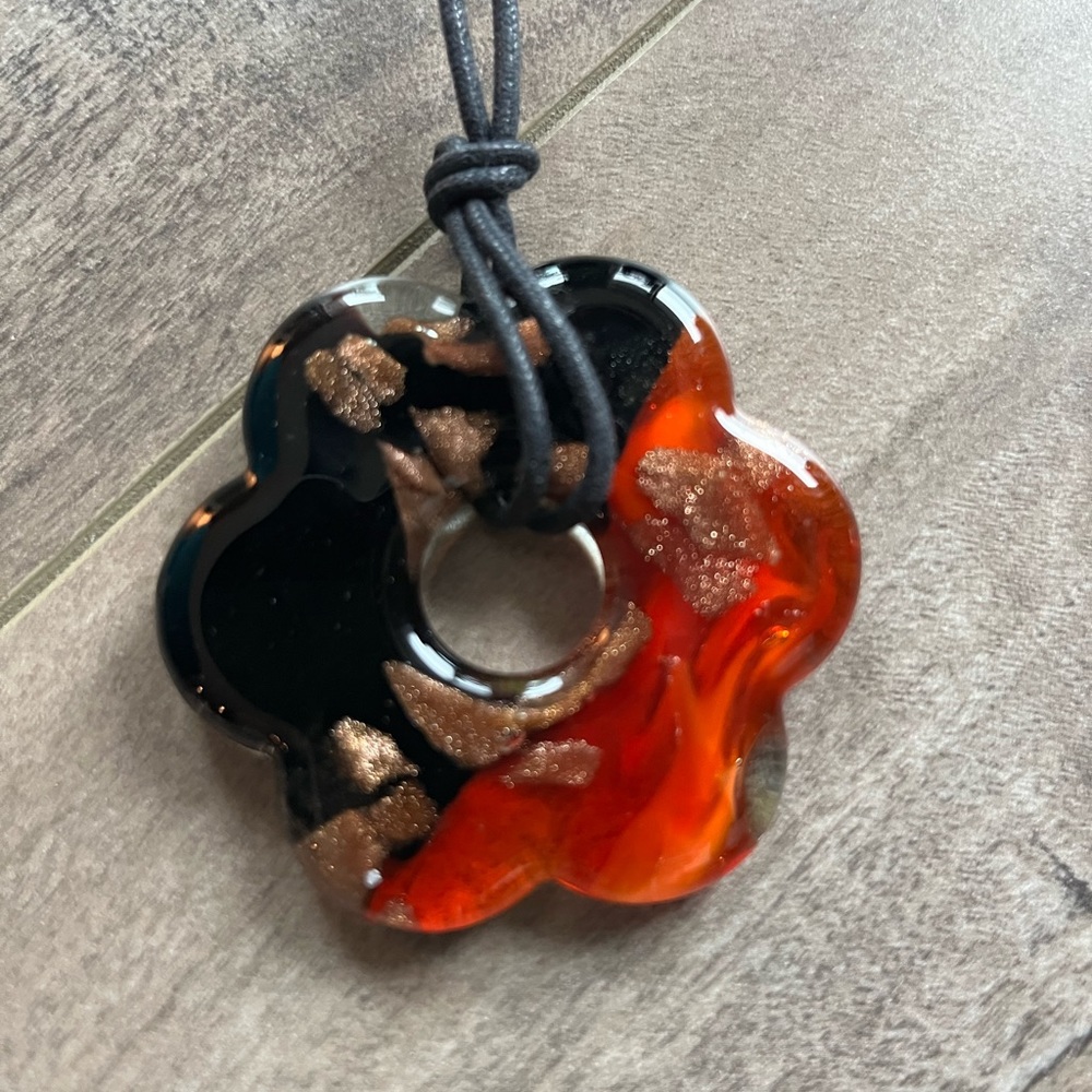 Stunning black and red dichroic glass necklace on leather cord
